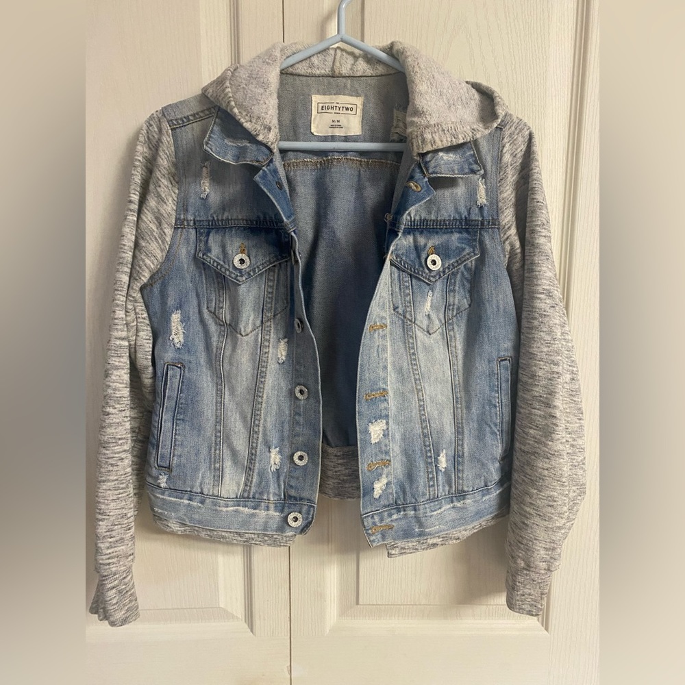 Eightytwo denim Distressed jean
jacket with grey sweatshirt sleeves and hood